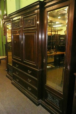 Lot 684 - Late Victorian walnut triple wardrobe