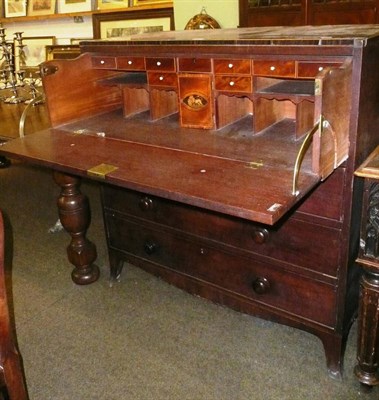 Lot 692 - An early 19th century secretaire chest