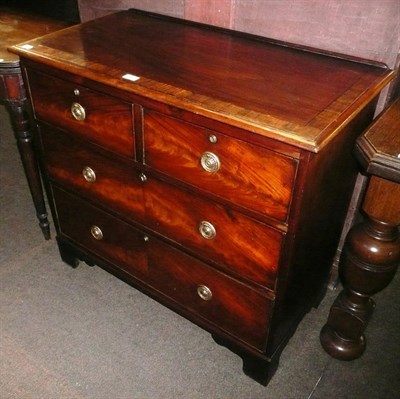 Lot 694 - A George lll mahogany and walnut three height chest