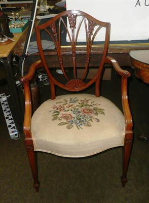 Lot 705 - An Edwardian carved satinwood armchair