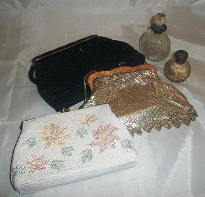 Lot 10 - White metal mesh evening purse, two later beaded evening bags and two cut glass scent bottles...