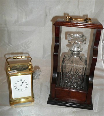 Lot 15 - A brass carriage clock and a single tantalus