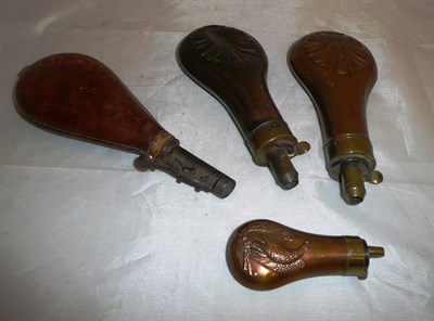 Lot 53 - Three copper shot flasks and a leather cased flask (4)