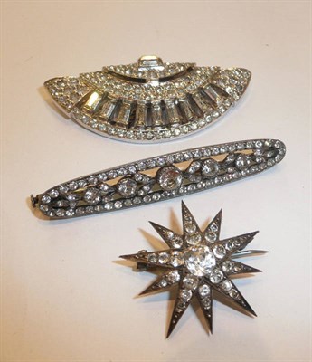 Lot 56 - Three paste brooches, one in a fan shape, measures 5.7cm by 2.4cm, one in the form of a star,...