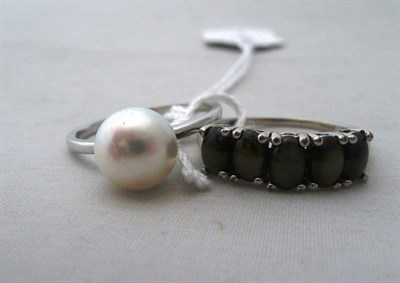 Lot 59 - A 9ct white gold cultured pearl ring and a 9ct gold five stone ring