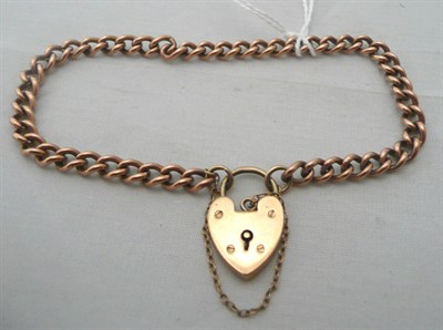 Lot 74 - A curb and lock bracelet