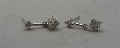 Lot 82 - A pair of diamond-set drop earrings