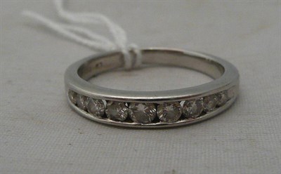Lot 86 - A diamond half eternity ring