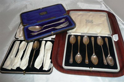 Lot 115 - Two cased sets of six silver teaspoons and a cased silver christening set