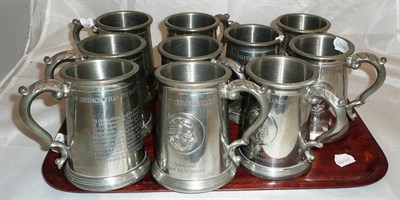 Lot 170 - A set of ten pewter pint mugs depicting 'Ten Greatest Commanders' with glass bases