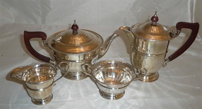 Lot 198 - Four piece silver tea set by Adie Bros, 31oz