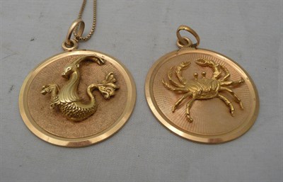 Lot 209 - Two pendants stamped '18k' and a chain