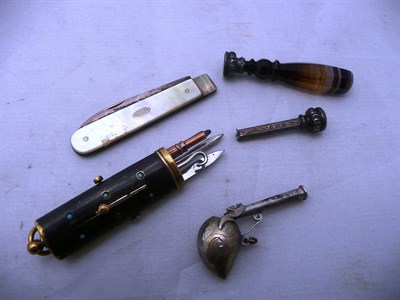 Lot 210 - Combination button hook, knife, pencil and toothpick, agate seal, whistle, fruit knife, etc