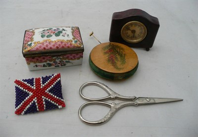 Lot 214 - Bakelite clock tape measure, fernware pin wheel, porcelain box and cover, scissors etc