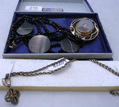 Lot 216 - Victorian locket brooch, paste pendant and an agate necklace