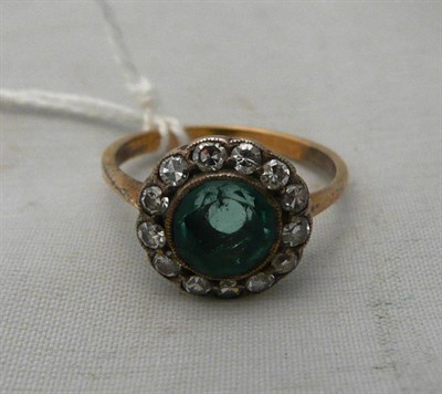 Lot 218 - Emerald and diamond cluster ring