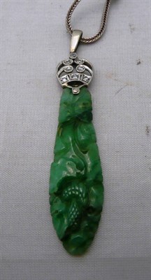 Lot 219 - Jade and diamond pendant on chain