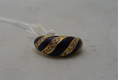 Lot 229 - An 18ct gold blue enamelled and diamond-set ring