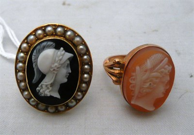 Lot 253 - A cameo ring with split pearls and another cameo ring