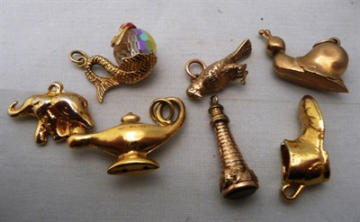 Lot 255 - Seven charms, most in 9ct gold