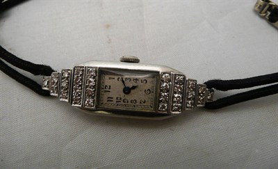 Lot 257 - A lady's diamond-set wristwatch, cased inscribed 'platinum'