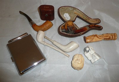 Lot 268 - Meerschaum pipe, two clay pipes, travelling light, netsuke and two bone carvings