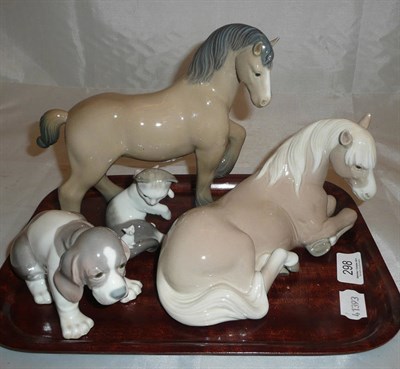 Lot 298 - Four Lladro figures including horses, puppy and a cat (4)