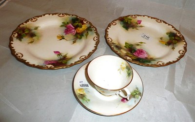 Lot 316 - A pair of Royal Worcester porcelain dessert plates, signed M Blake, year code for 1912,...