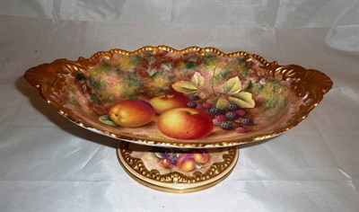 Lot 320 - A Royal Worcester porcelain fruit-painted pedestal dish signed H Ayrton, printed crown and...