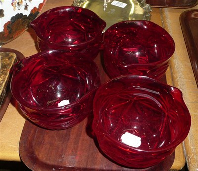 Lot 338 - A set of four ruby glass rinsers