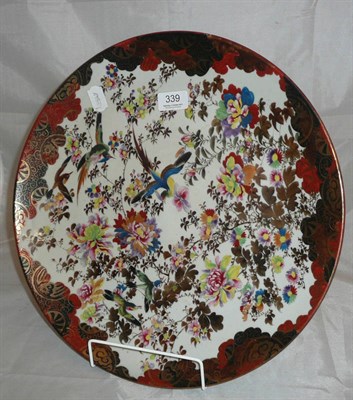 Lot 339 - Japanese plaque decorated with chrysanthemums and an exotic bird