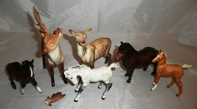 Lot 342 - A Beswick Shetland pony, three foals and two deer (a.f.)