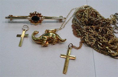 Lot 376 - Bar brooch, five chains, a cross and a dinosaur pendant