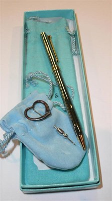 Lot 377 - Tiffany stick pin and pen