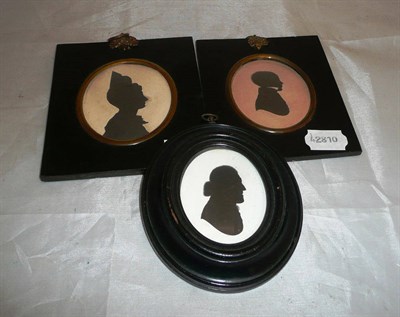 Lot 406 - Three miniature silhouette portraits