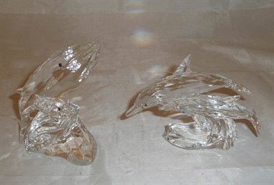 Lot 447 - Swarovksi crystal group of two dolphins marked 'SCS 92 MSt' and another similar 'SCS 92 Mst'...