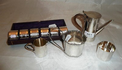 Lot 461 - Silver hot glass holder, silver plated miniature three piece coffee service and a cased set of...