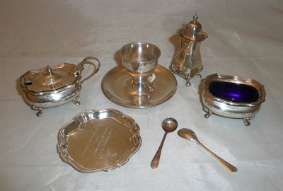 Lot 468 - Silver egg cup, three piece cruet and a pin tray