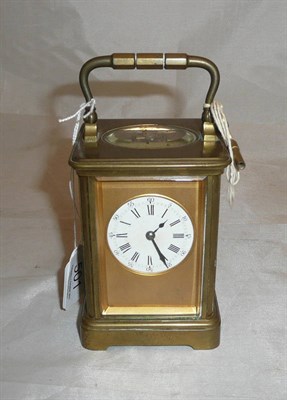 Lot 501 - A brass striking carriage clock