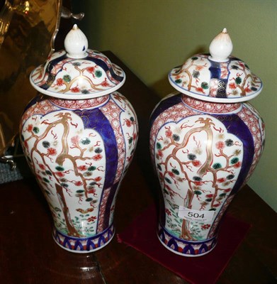 Lot 504 - A pair of Imari vases