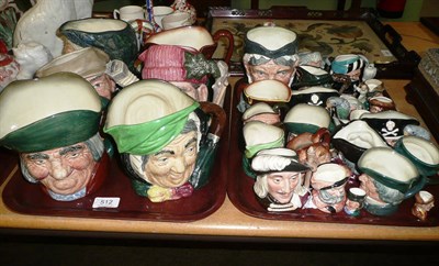 Lot 512 - A collection of Royal Doulton character jugs - seven large, fourteen medium, eight small, two...