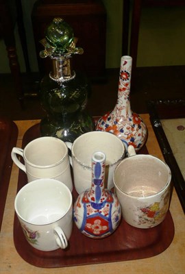 Lot 513 - Two Imari spill vases, four souvenir mugs and a silver mounted green glass decanter and stopper