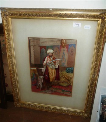 Lot 586 - V Carriarelli, an Eastern man looking at a sword, watercolour