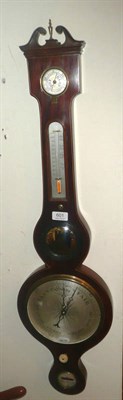 Lot 601 - A Victorian wheel barometer, E Emanuel of Peterborough