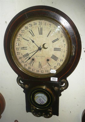 Lot 602 - A Seth Thomas calendar striking wall clock