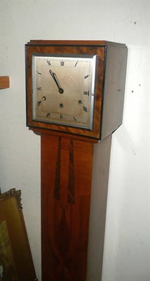 Lot 605 - A walnut Art Deco grandmother clock