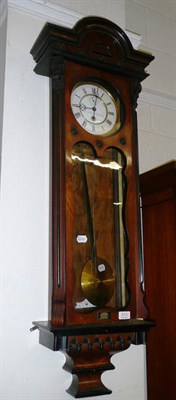 Lot 613 - A walnut-cased Vienna-type wall clock signed G Kirton, Stockton