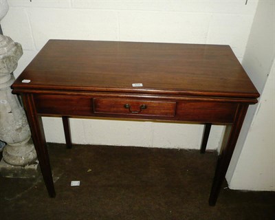 Lot 614 - 19th century mahogany fold-over tea table