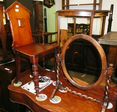 Lot 644 - A mahogany hall chair and an oak-framed dressing mirror