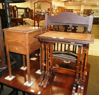 Lot 650 - An oak demi-lune stick stand, a mahogany three tier cake stand, a nest of three occasional...